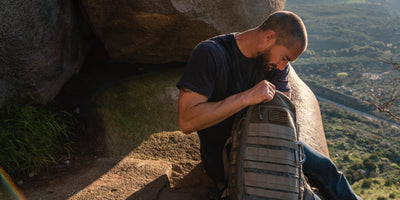 Man on mountain with backpack