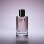 Bravo Sierra Smoked Orris perfume bottle, elegant glass with black cap, featuring a light purple hue.