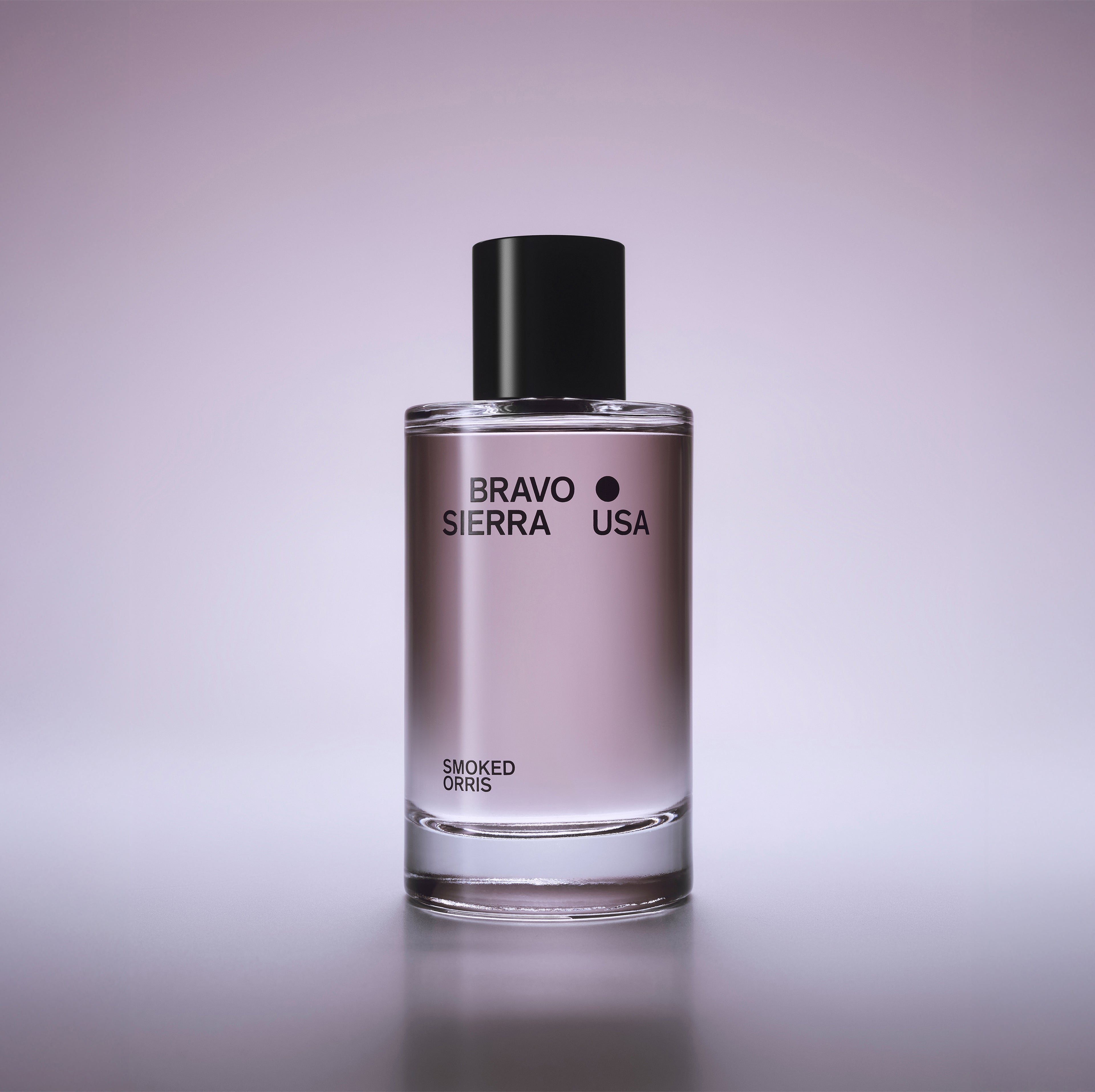 Bravo Sierra Smoked Orris perfume bottle, elegant glass with black cap, featuring a light purple hue.